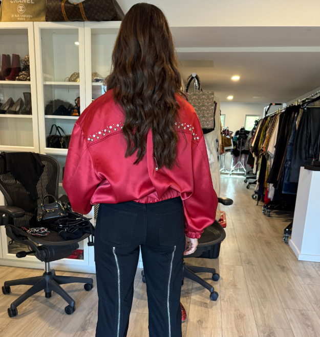 Travel tailoring a jacket for Alanis Morissette
