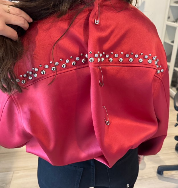 Travel tailoring a jacket for Alanis Morissette